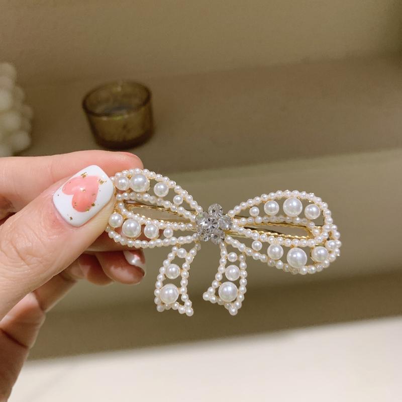 ・カテゴリ: ヘアアクセサリー・スタイル: 韓国風・対象: 女性・形状: 蝶結び・素材: パール・人気要素: 蝶結び、継ぎ目・種類: サイドクリップ