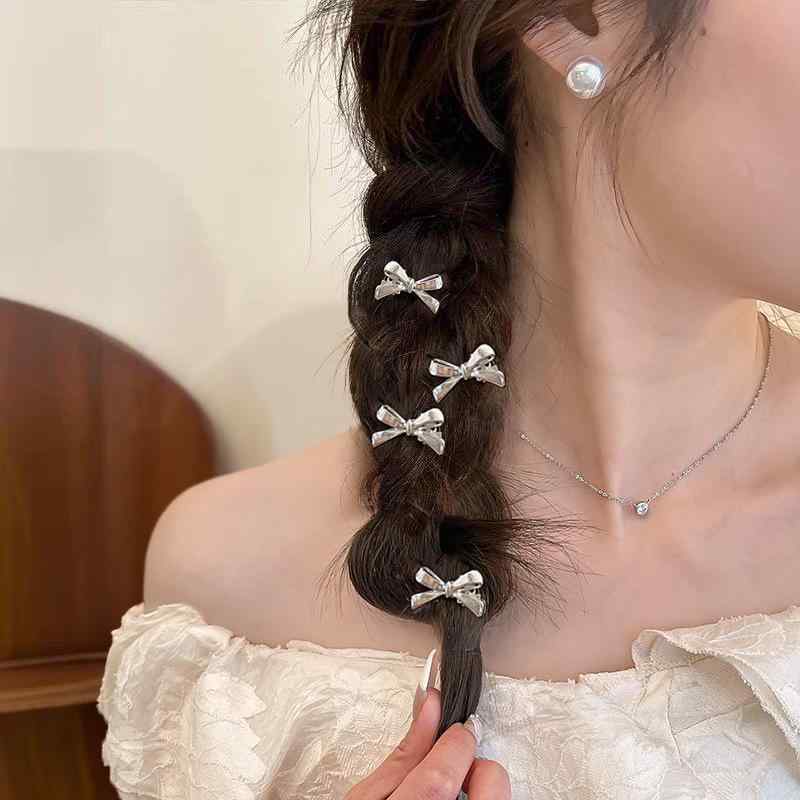 ・カテゴリ: ヘアアクセサリー・タイプ: つかみクリップ・スタイル: 清新スイート・デザイン要素: 蝶結び・対象: 女性・カラー: シルバー