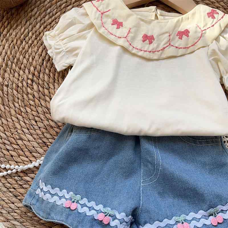 Rakuten - Tシャツ 女の子 半袖 フリル領 リボン付き デニムショーツ 夏 2点セット コットン 薄手 柔らか素材 無地 かわいい 普段使い カジュアル