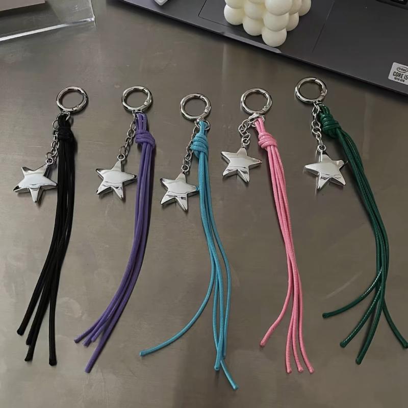 バッグチャーム キーホルダー ベルトハンガー レトロ 星モチーフ タッセル フリンジ アクリル 黒 紫 ピンク 冬 かわいい スイート 爽やか 普段使い おしゃれ デザイン