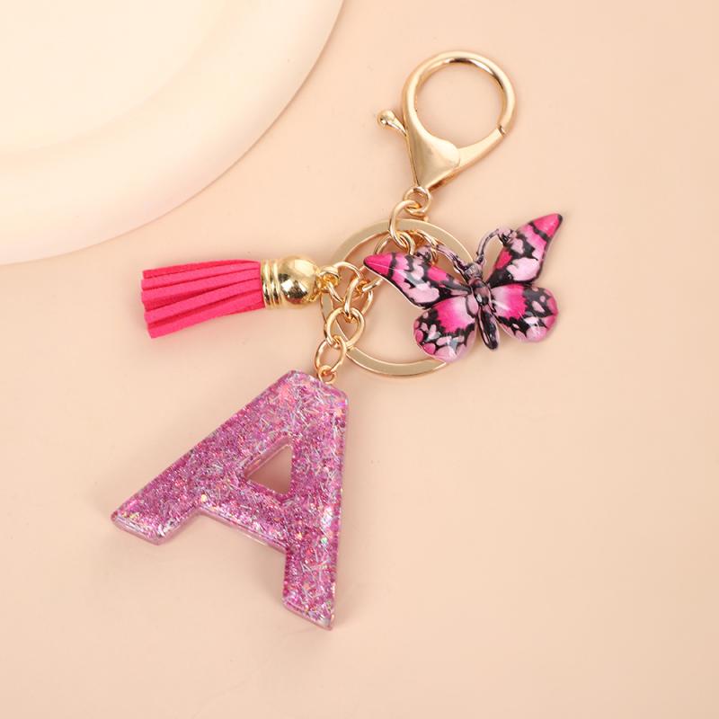 キーホルダー 紫 蝶 タッセル イニシャル 流砂 スパンコール クリスタル レジン ハンガー アクセサリー 植物 花柄 森系 かわいい