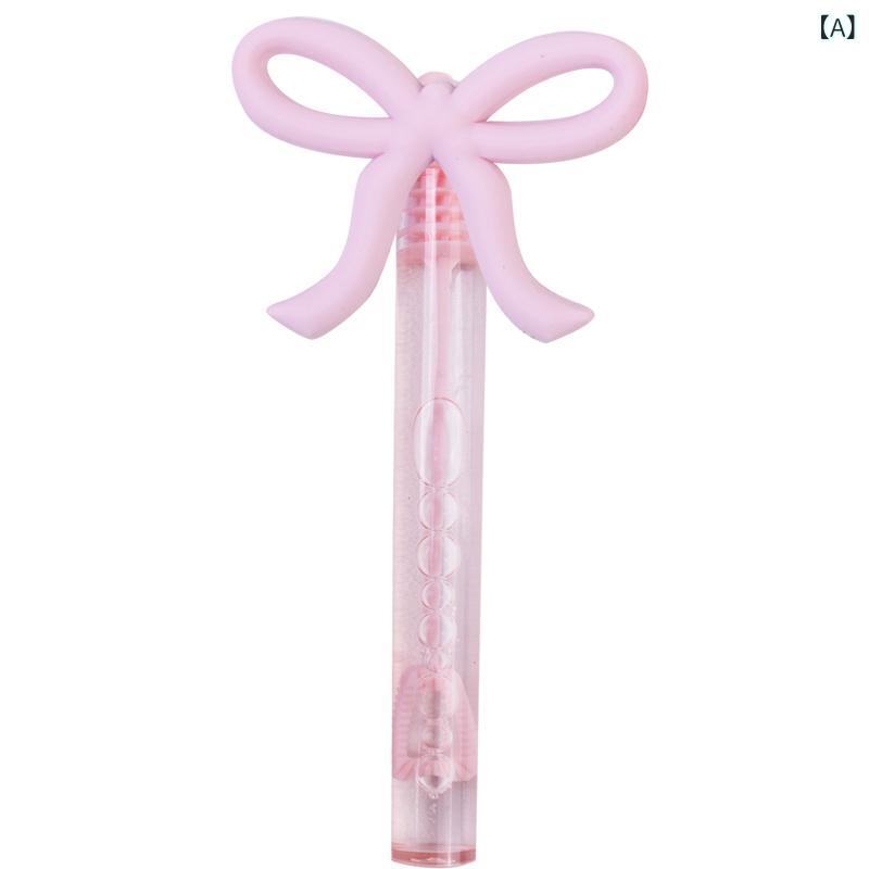 ふんわり暮らし鞄店のおもちゃ 泡泡棒 シャボン玉スティック リボン ちょう結び ミニサイズ 手持ち 携帯用 かわいい｜アングル2