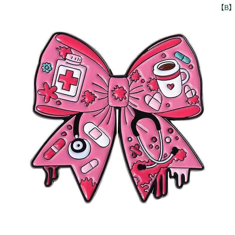 ブローチ ユニセックス かわいい ピンク リボン 医療器具 聴診器 注射器 モチーフ 合金 メッキ加工 ピンバッジ アクセサリー 記念 飾り プレゼントの商品画像 3