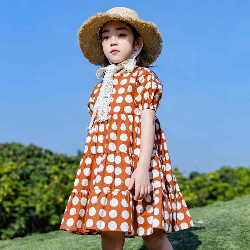 ・カテゴリ: ワンピース・スタイル: 韓国風、田園風・主な素材: 綿 ・対象性別: 女の子・対象年齢: 8歳以上（身長140cm以上）・柄: ドット柄・生地加工: 柔軟加工・袖丈: 半袖・シルエット: Aライン・カラー展開: オレンジ・サイズ展開: 120cm、130cm、140cm、150cm、160cm