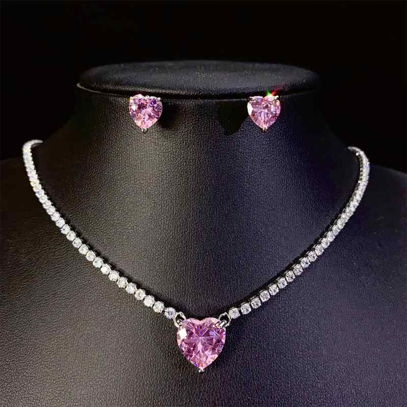Women's Jewelry Set: Necklace and Earrings (2-piece set) with Zirconia Heart Motif. Sparkling and elegant, perfect for weddings, parties, and formal occasions. Stylish and cute. Silver color.