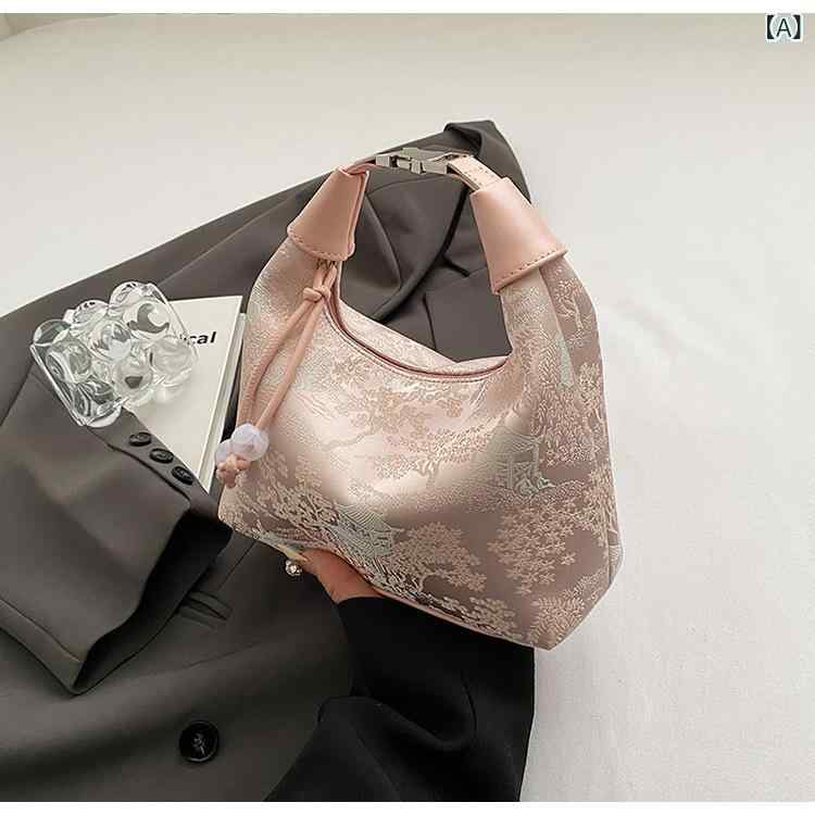 ・カラー展開: ピンク、ホワイト、ブルー、ブラック・スタイル: 伝統的エスニック・素材: 帆布・バッグのトレンドスタイル: クラウドバッグ・バッグのサイズ: 小・人気の要素: ロック・裏地素材: ポリエステル・バッグの形状: 餃子型・開閉方式: ファスナー・バッグの内部構造: ファスナーポケット・硬さ: やや柔らかめ・利用シーン: 日常コーディネート・ショルダーストラップの数: 1本