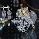 ウェディングヘッドドレス ウエディングヘッドドレス ヘアアクセサリー カチューシャ イヤリング フェザー 羽毛 翼 シルバー 結婚式 花嫁 ブライダル パーティ...