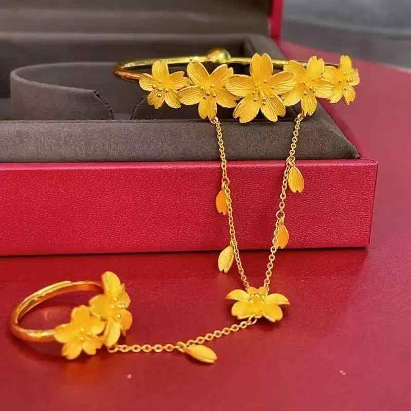 ブレスレット レディース 結婚式 ジルコニア 指輪 一体型 ゴールド 桜 手元 手飾り 高級感 花 フラワー パーティー