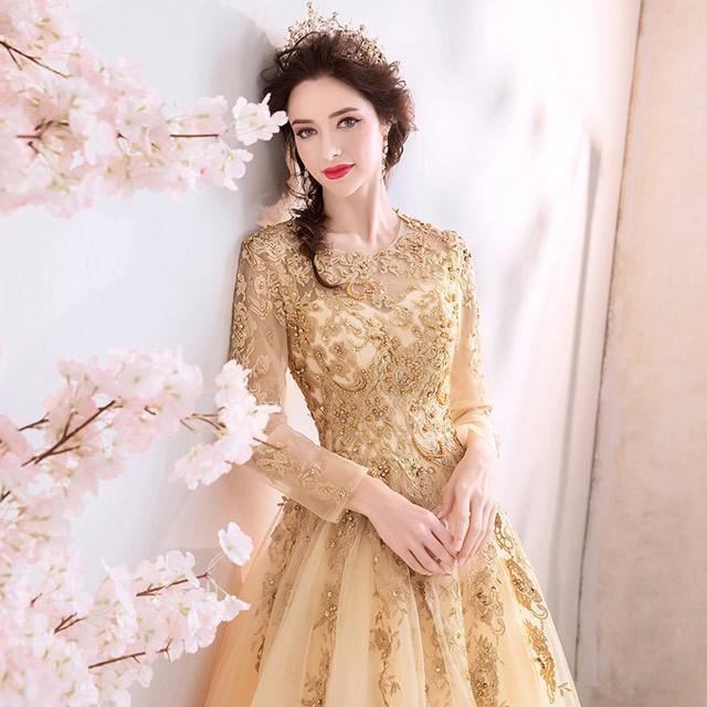 【5と0のつく日限定！1着半額！まとめ買い2枚購入割引クーポン利用で！ 】イブニングドレス 金色 長袖 ロングドレス 豪華 発表会ドレス 背開き キレイめ パーティードレス 二次会 お呼ばれドレス Aライン 素敵 演奏会