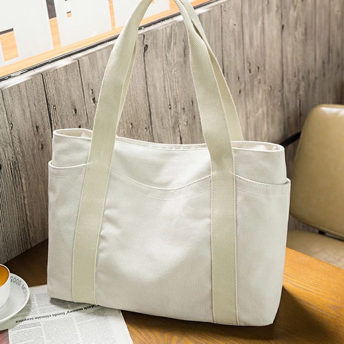 Rakuten - トートバッグ レディース 肩掛けバッグ レディースカバン キャンバス PCノート収納 トート おしゃれ キャンバスバッグ 無地 A4収納 お出かけ肩掛け バッグ 女の子 軽量 通勤通学 多ポケット かわいい 黒/白 送料無料