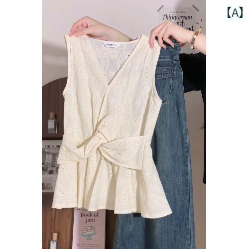 シャツ ノースリーブ レディース トップス ユニークなと 美しい ウエストに フィット する トップスを 備えた 夏用の フランス製 Vネック ツイスト ノースリーブベスト シャツ。