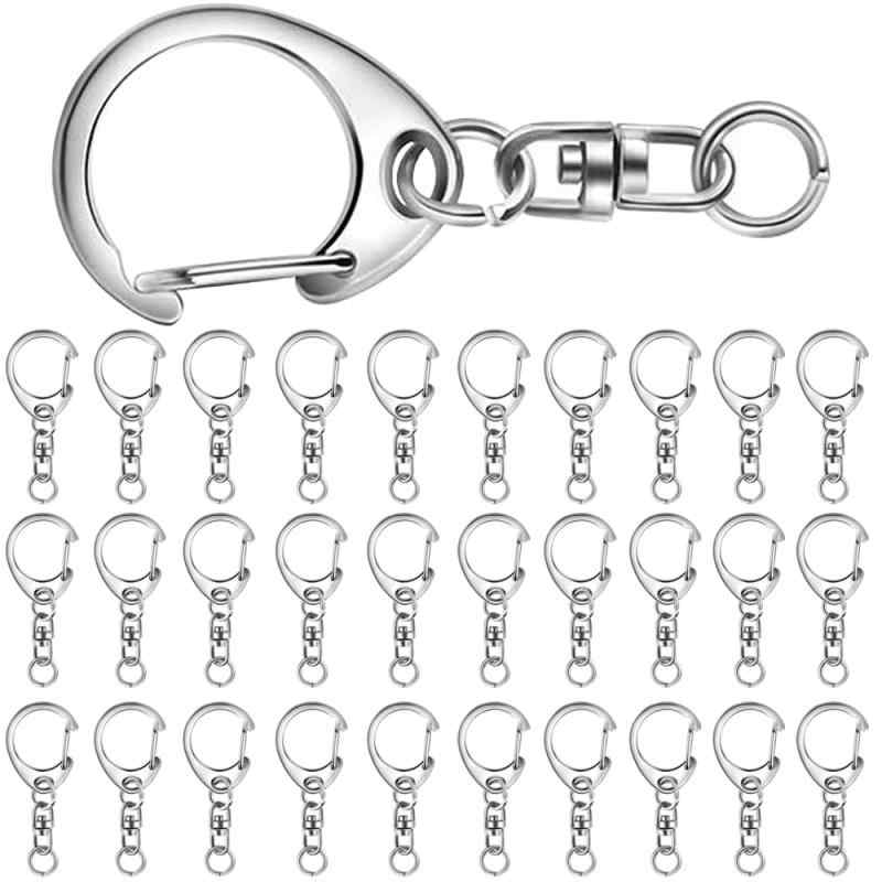 キーホルダー金具 30個セット ワンタッチ キーホルダー 回転フック パーツ キーリング リング ナスカン 回転カン付き DIY 手芸用品 ハンドメイド アクセサリー (シルバー)商品仕様：キーホルダー・アクセサリー30個。 カラー：シルバー、重量：約90グラム。材質：耐久性のあるニッケルメッキ表面処理、効果的に金属アクセサリーの表面を保護し、優れた防錆特性を持ち、丈夫で耐久性があります。使いやすさ：ワンタッチキーホルダーは手芸界で人気があり、片手で簡単に使えます。 フェルトマスコット、レジン、レザーのアクセサリーがワンタッチで素早く取り付けられます。 変形しない丈夫な素材を使用し、ニッケルメッキで光沢感を出しているので、あらゆる小物に対応し、スタイリッシュさをアピールします。DIY：このキーホルダー金具はDIYに最適で、ナスカン、回転カン、丸カンを組み合わせて、直接キーホルダーに変身できます。 自分のマスコットを取り付けて、世界に一つだけのオリジナルキーホルダーを作ろう。手作りギフト：このキーホルダー金具があれば、バッグの飾りや絶妙なキーホルダーを簡単に作ることができます。 シンプルで高級感のあるデザインで、かわいい手作りプレゼント、誕生日、お祭りなどの記念日、分類されたアイテムの日常管理などに適しています。