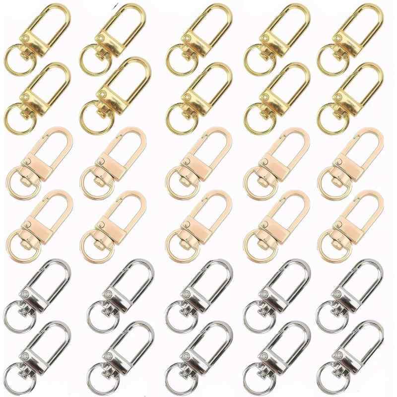 BOJIDO ナスカン キーホルダー 金具 30個セット ワンタッチ式 回転フック360度 修理交換パーツ DIY用手芸用品 薄型カラビナキーリング ループキーホルダー【製品内容】ワンタッチキーホルダー金具を30個含むセットで、色はKCゴールド、シルバー、ゴールドがあり、全長約34mm、フック内径は縦約14mm・横約7mmで。【高品質素材】金属を素材とし、ニッケルメッキ仕上げで表面を保護して耐錆び性に優れ長期間使用でき、表面に美しい光沢があって高級感を醸し出し、変形しにくい頑丈な造りになっています。【商品の特徴】ワンタッチ式設計で取り扱いが簡便で、フックは回転式で360度方向を自在に調整でき、DIY用や手芸用品の修理・交換パーツとして適し、オリジナルなアクセサリーやキーホルダーを作るのに役立ちます。【使いやすい】バッグやベルトなどにワンタッチで簡単に取り付けられ、回転フックは表裏を気にせず使用できるため、使用時にねじれることが少なく手間を省け、日常での操作が非常に簡便です。【幅広い用途】ポケットフィギュアや羊毛フェルトのペンダントと組み合わせてオリジナル手作りアクセサリーにでき、プラ板、フェルトマスコット、レジン、革小物と共にキーホルダーやバッグチャーム、ネックストラップも作成可能で、母の日、父の日、誕生日、クリスマスなどの手作りプレゼントにも適します。