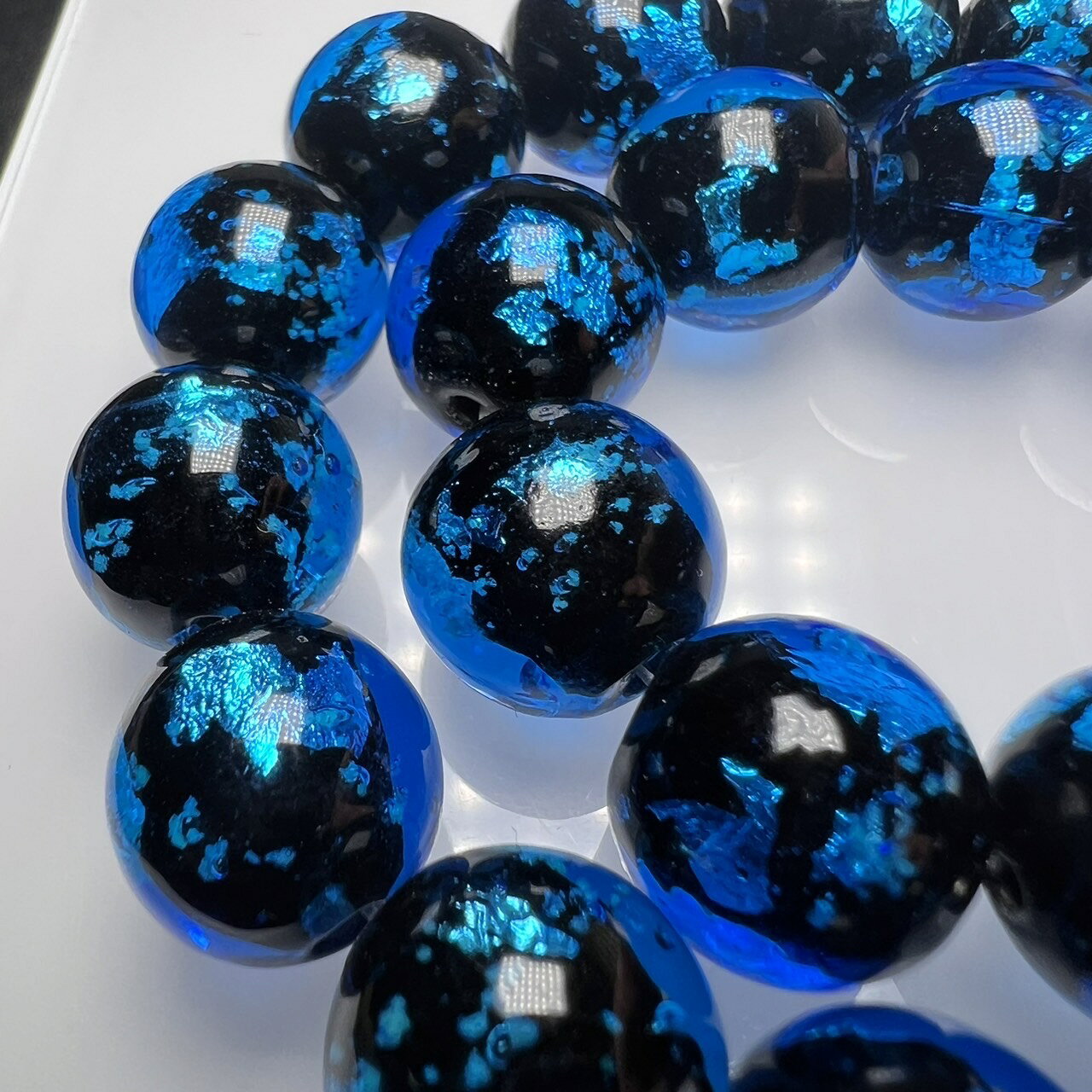 ホタルガラス 14mm 連売り 28粒 ブルー とんぼガラス とんぼ玉 蓄光 夜光タイプ 　...