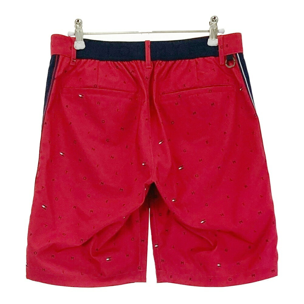 TOMMY HILFIGER GOLF トミー ヒルフィガーゴルフ ハーフパンツ ロゴ総柄 レッド系 M 【中古】ゴルフウェア メンズ