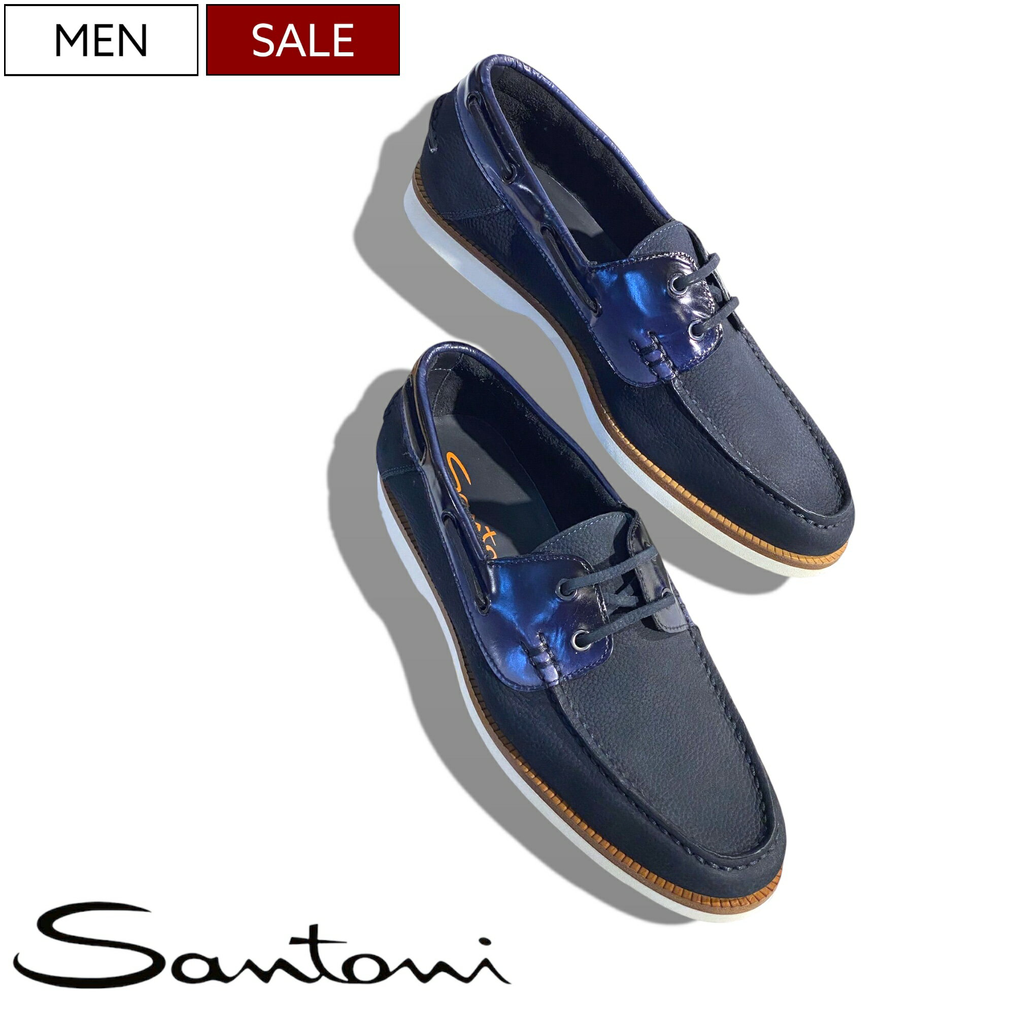 ブランド Santoni -サントーニ- カラー ネイビー 加工・特徴 エナメルコンビネーションイタリアンレザーブランドロゴラバーソールイタリア製 ※箱に傷や破損などが御座いますが、予めご了承の上ご購入下さい。 定価 105,600円(税込) ご注意 ※ウォッシュ加工されているアイテムにつきましては若干の誤差はご容赦ください。 ※採寸方法については　コチラをご確認くださいませ。 ※実物を巻尺で採寸しての平均値です。お手持ちのアイテムとのご比較にご利用くださいませ。 ※店頭でも販売させていただいておりますので、売り違いの際はご容赦願います。 サイズ ブランド公表日本換算サイズ 6 24.5〜25.0cm 6.5 25.0〜25.5cm 7 25.5〜26.0cm 7.5 26.5〜27.0cm 8 27.0〜27.5cm 8.5 27.5〜28.0cm 9 28.5〜29.0cm ■メーカー希望小売価格はメーカー商品タグに基づいて掲載しています ----------------------------------------------------------------- ----------------------------------------------------------------------------- ABOUT US スタジオ ルート134 ----------------------------------------------------------------------------- TOP PAGESantoni 伝統や品質を重視しつつも革新的なデザインで大人を魅了するエナメルレザーコンビネーションデッキシューズ 熟練した職人の伝統的な製法と現代的な製法を巧みに取り込んだレザーコンビネーションデッキシューズ。 この手の靴にありがちな野暮ったさは一切なく、大人の品格と余裕を漂わせる逸品。 また、細部に至るディテールや履き心地も優れており計算し尽くされたデザインに圧巻。アウトソールはグリップ力とクッション性を強化しており、滑りにくいのが特徴で耐久性にも優れております。この機会に是非。 《ブランド説明》 1975年にイタリア マルケ州にて創業された、伝統的なクラフトマンシップとモダンなイタリアンエレガンスが融合したブランドです。コンセプトは、“tradition＆Innovation(伝統と革新)”。 小さな高級紳士靴工房から始まった＜サントーニ＞はmade in Italyにこだわり、すべての靴は自社工場にて職人の手によって作られています。クオリティ、細部への情熱、こだわりのハンドメイドを守る一方、革新的なデザインや技術を取り入れ、究極のデザインを探求し続けることで、唯一無二の存在感を示しています。 ご注意ください ご覧頂いている商品の写真につきましては、できるだけ実物の色に近くなるように努めておりますが お使いの環境（モニター、ブラウザ、スマホ・タブレット）の設定などの違いにより、色の見え方や風合いが実物と異なる場合がございます。 予めご了承ください。