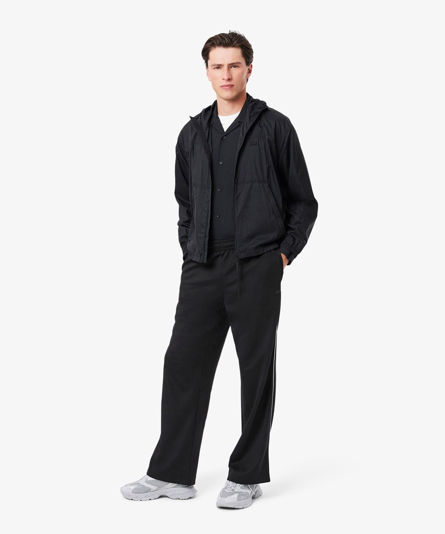 【SALE／40%OFF】LACOSTE サイドパイピングルーズフィットトラックパンツ ラコステ パンツ ジャージ・スウェットパンツ ブラック【送料無料】