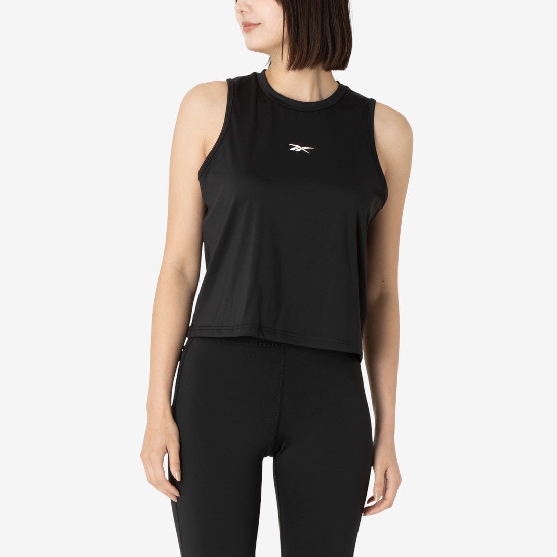 トレイン クロップド タンクトップ / ID TRAIN CROPPED TANK リーボック トップス ノースリーブ・タンクトップ ブラック ピンク