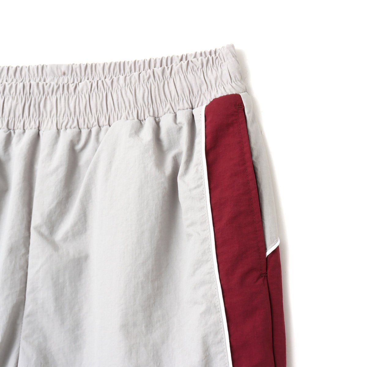 atmos pink UMBRO x atmos pink Track Pants BURGUNDY アトモス パンツ その他のパンツ