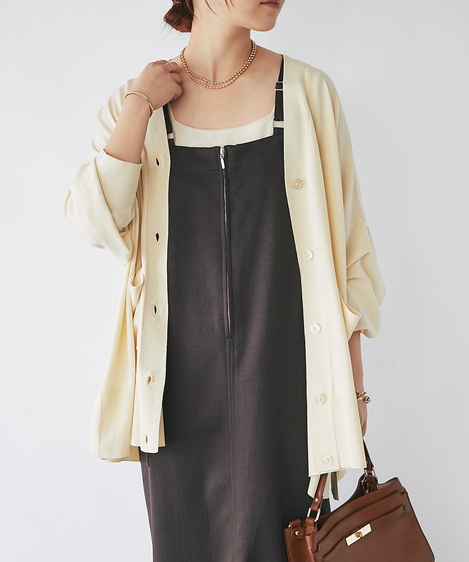 un dix cors 《予約》《あたたかみのあるカラー展開》ニットポンチョカーディガン アンディコール トップス カーディガン ホワイト ネイビー ブラウン【送料無料】のサムネイル