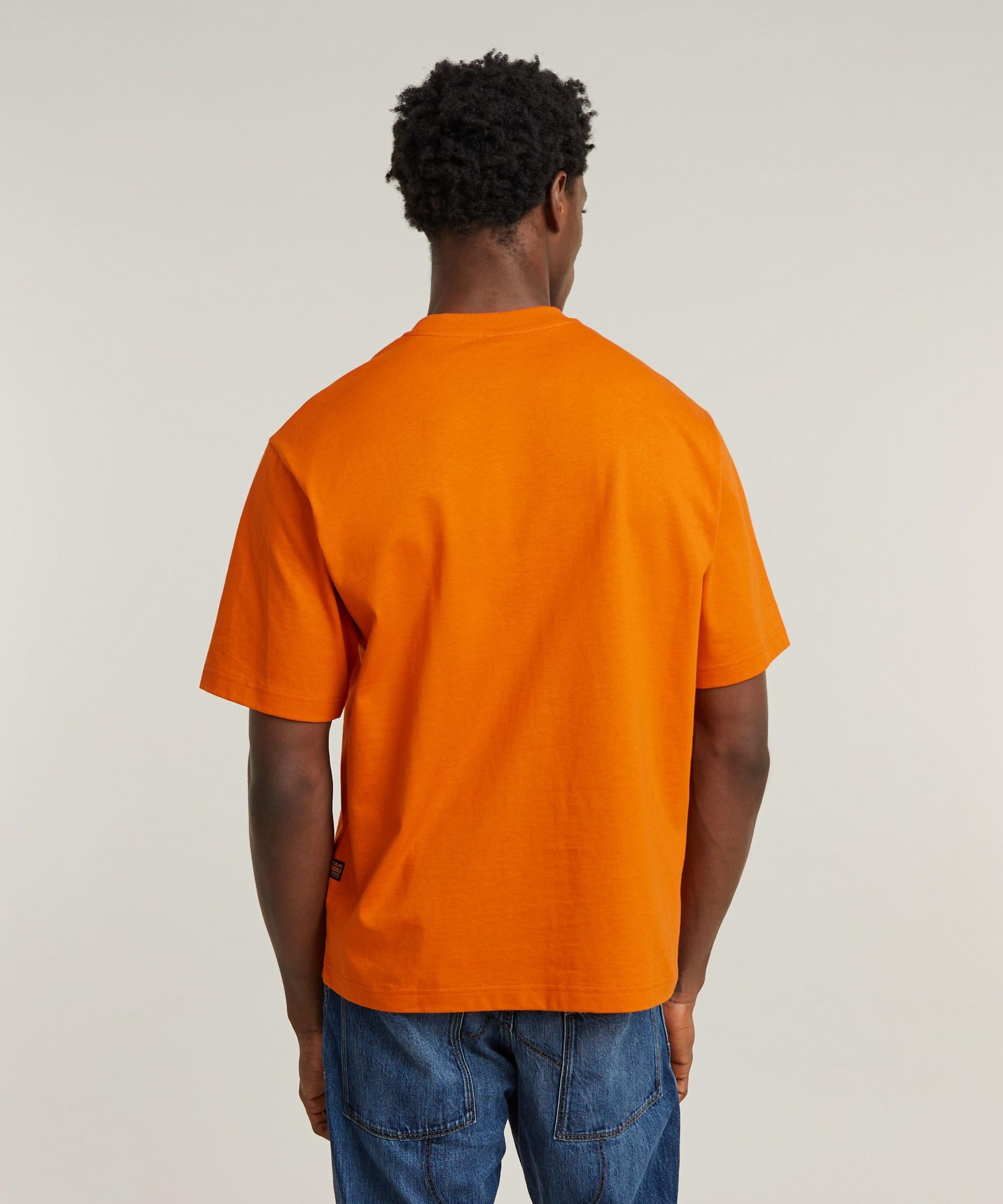 【公式ショップ】CENTER CHEST BOXY T-SHIRT/フロントロゴボクシーフィットTシャツ ジースターロゥ トップス カットソー・Tシャツ オレンジ