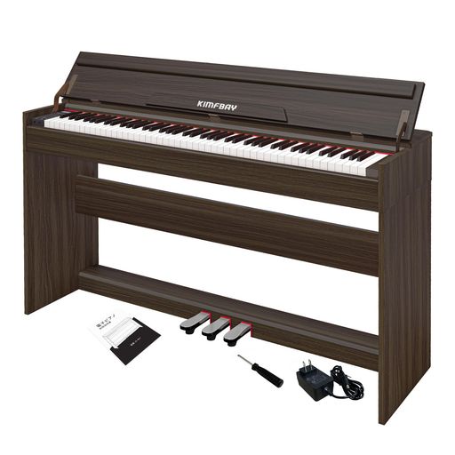 【ピアノ88鍵盤】KIMFBAY電子ピアノは、従来のピアノと同じサイズの鍵盤を備えています。ピアノ鍵盤は指の圧力に敏感で、押す圧力に応じて音量を調整できます。あらゆる年齢層の方に、指の筋力と柔軟性を鍛えるのに最適です。3本のペダルを装備し、より表現力豊かな演奏が可能なピアノです。 【大規模なサウンドライブラリ】ピアノはフランス製のDREAMデジタルチップを搭載し、伝統的なピアノの音色を再現しています。2つの高出力ステレオスピーカーが、臨場感あふれるサウンド体験をもたらします。電子ピアノには128種類の音色、88曲のデモ曲、100種類のリズムが内蔵されており、様々なジャンルの曲の作曲や録音にインスピレーションを与えることができます。 【優れた互換性】ワイヤレス接続により、さまざまなピアノ教育ソフトウェアを使用できます。通过MIDI-USB电缆将您的计算机连接到数码钢琴并编排您的音乐。ヘッドフォンを接続すると内蔵スピーカーがミュートされ、個人練習にも最適です。 【多彩な機能】電子ピアノにはさまざまな機能が備わっています。移調機能、伴奏機能、コード、メトロノーム、録音、再生など。