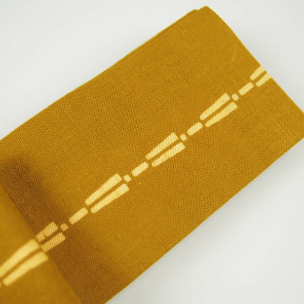 源氏 平ぐけ帯　柄 : おかめ・ひょっとこ　金茶　[ お祭り用品 祭り 衣装 祭り用品 お祭り お祭り衣装 祭り衣装 帯 おび 男 女性 着物 角帯 和柄 細角帯 大人用帯 ひらぐけ ]