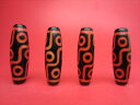 【チベット天珠】逆九眼天珠・濃赤油潤加工38×12mm
