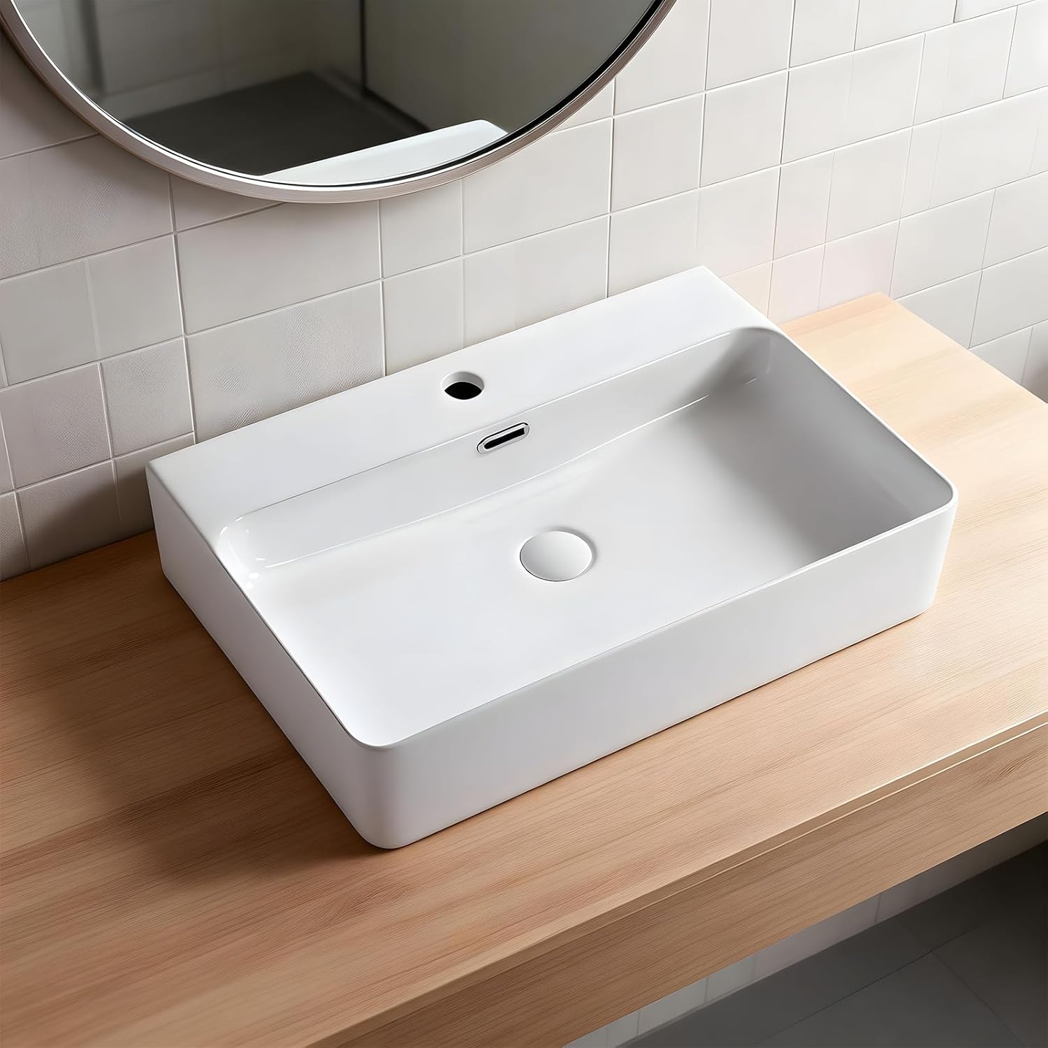 商品詳細 商品名 洗面ボウル 置き型 手洗い器 排水管付き 陶器 長角型 おしゃれ コンパクト 洗面台 省スペース 60.5×42×13cm (ホワイト) サイズ 68x49x22cm カラー ホワイト 材質 瓷 商品概要 【製品サイズ】ボウル外寸：605×420×130mm。洗面ボウルのサイズが十分大きいので、手洗いや歯磨きの際に水はねを防ぎ、快適にご使用いただけます。【オシャレなデザイン】この洗面鉢は陶器のもつ落ち着いた質感と、シンプルな長方形で室内のどんなデザインにも合わせやすく、個性豊かな洗面空間を作り上げられます。また、陶器製の手洗い器は見た目が美しく大容量ということもあって、洗面台の定番となっています。【付属品で簡単設置】この手洗い器には、排水トラップおよび設置に必要なその他部品が付属しています。洗面ボウルと排水金具の設置は簡単なので、取扱説明書どおりに設置すれば完了です。【掃除しやすい】大型洗面ボウルは高温で焼き上げております。伝統工芸とモダンなデザインを組み合わせた白い洗面ボウルは、洗面所全体に清潔でシャープな印象を与えます。洗面器の表面には釉薬を施しており、滑らかで光沢があります。表面が滑らかで汚れが溜まりにくいので、サッと拭くだけできれいになります。【多シーン対応】この手洗い器は、和風からモダン風まで様々なインテリアに溶け込み、商業施設はもちろん、一般家庭の洗面所、浴室、トイレといった場所に幅広く活用できます。 商品情報 商品の説明 コンパクト据え置き設計： 特別な工事不要で自由に配置可能、トイレ・浴室・キッチン脇などの小スペースに最適。 高密度陶磁器素材： 1300℃高温焼成で耐傷・耐熱性に優れ、抗菌釉薬加工で黄変を防止。 付属品同梱： 排水トラップおよび設置部品が付属しており、専門知識なく簡単に設置可能。 多様な空間対応： 一般住宅から商業施設まで、和風・モダンなどあらゆるインテリアに調和。 【注意事項】： ・当店の商品は全て国内から配送されます。 ・国内配送の商品は国内でのお買い物と同じく消費税が発生いたします。関税はかかりません。 ＊色がある場合、モニターの発色の具合によって実際のものと色が異なる場合がある。 メーカー希望小売価格はメーカーカタログに基づいて掲載しています