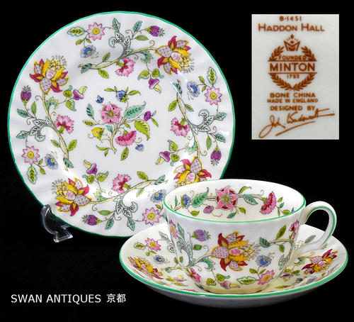 英国製イギリス ミントン Minton ハドンホール グリーン カップ＆ソーサー＆16cmプレート トリオ 未使用 廃盤品 ハドンホールはイングランドの古城、ハドンホール城の壁画とタペストリーをイメージし、 ジョン・ワズワース氏がデザインし1948年に製作されました。 このシリーズはミントンの中では一番ポピュラーなカップ＆ソーサーです。 今ではインドネシアで生産されていますが、この品は廃盤となった英国製です。 この商品は英国での製造年が長く続いたロングセラーのため、年代によって色や質感、大きさ等に少々違いがあります。 トリオの場合プレートの色合いが、カップ＆ソーサーと少々の色合いの違いがある場合があります。 ご了承ください。 ■サイズ：口径約 9cm ソーサー直径約15cm プレート約15.7cm-16.8cm ■状態： 未使用ミントン Minton　ハドンホール グリーン　カップ＆ソーサー＆プレート　トリオ　未使用 廃盤品