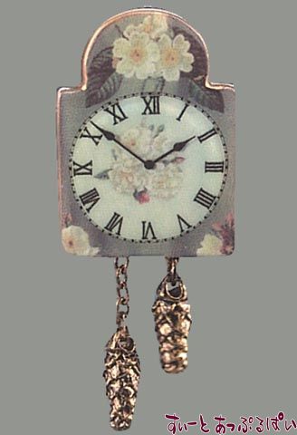ドイツロイター社製のはと時計です。こんなかわいらしい時計を、ぜひ貴方のドールハウスに！プレゼントや自分へのご褒美にもいかがでしょうか！高さ約50mm（振り子含む）アクリルケース入りです。アクリルケースのサイズ：8x6x5cm。※針は動きません。