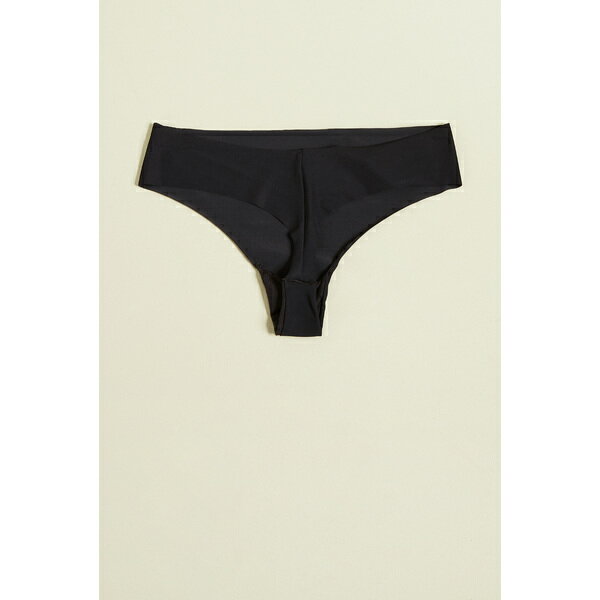 (取寄)カルバンクライン アンダーウェア レディース インビジブル トング 3 パック Calvin Klein Underwear Women's Invisibles Thong 3 Pack Speakeasy LightCaramel Black 送料無料