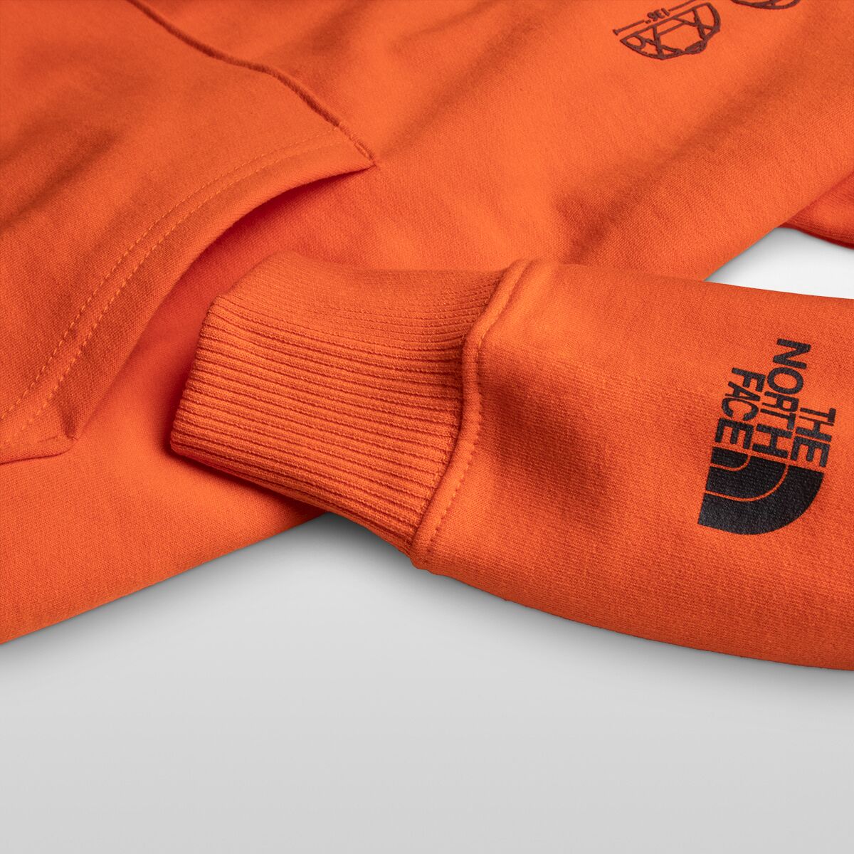 (取寄)ノースフェイス リサイクル エクスペディション グラフィック フーディ - メンズ The North Face Recycled Expedition Graphic Hoodie - Men's Red Orange