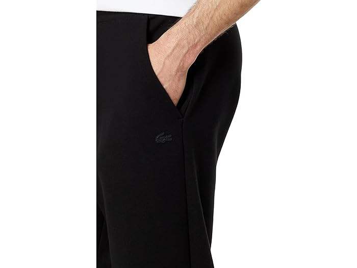 (取寄) ラコステ メンズ ソリッド アクティブ ダブル フェイス スリム ジョガーズ Lacoste men Solid Active Double Face Slim Joggers Black