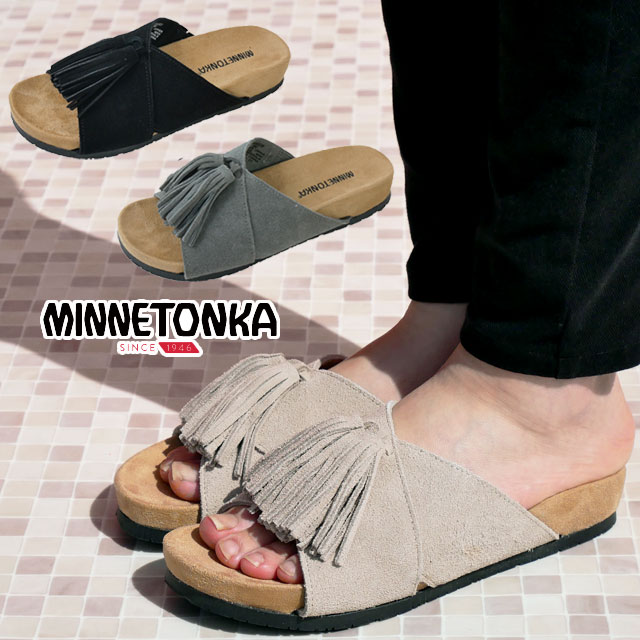 ＼ポイント8倍／ミネトンカ MINNETONKA レディース サンダル タッセル付き クロスベルトサンダル 靴 スエード ブラック 5690001 ストーン 5690280 グレー 5690039 カジュアルシューズ フラットシューズ コンフォート 歩きやすい 送料無料 あす楽 evid