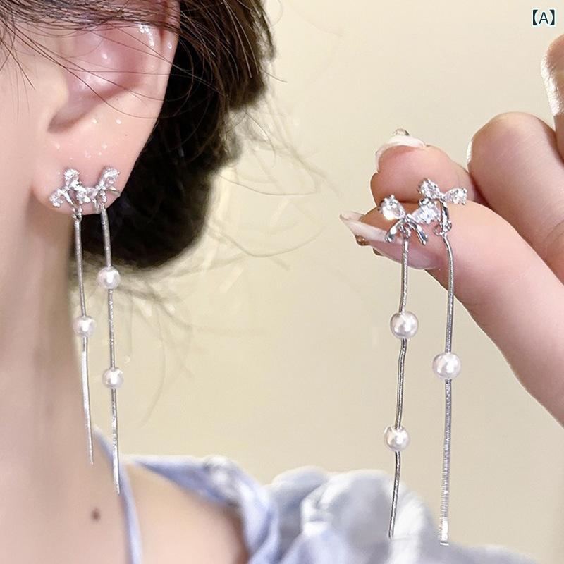 イヤリング レディース パール 揺れる ロング タッセル ジルコニア 蝶結び ノンホールピアス 耳飾り 上品 かわいい おしゃれ 華奢 シンプル エレガント 大人かわいい デザイン性 高見え アクセサリー デイリー パーティー 結婚式 二次会 謝恩会 お呼