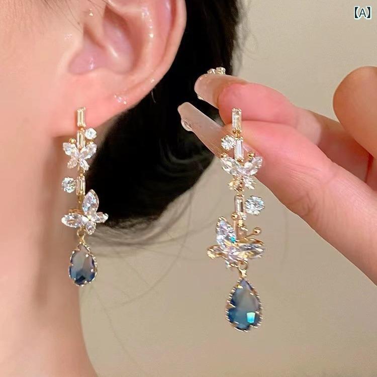 ピアス レディース 秋冬 ブルー ストーン 雫型 蝶々 モチーフ ロング イヤリング 高級感 揺れる アクセサリー 大粒 ジルコニア エレガント 華やか ジュエリー 大人かわいい 高見え パーティー用 デート用 ギフト用 プレゼント用 記念日用 結婚式用
