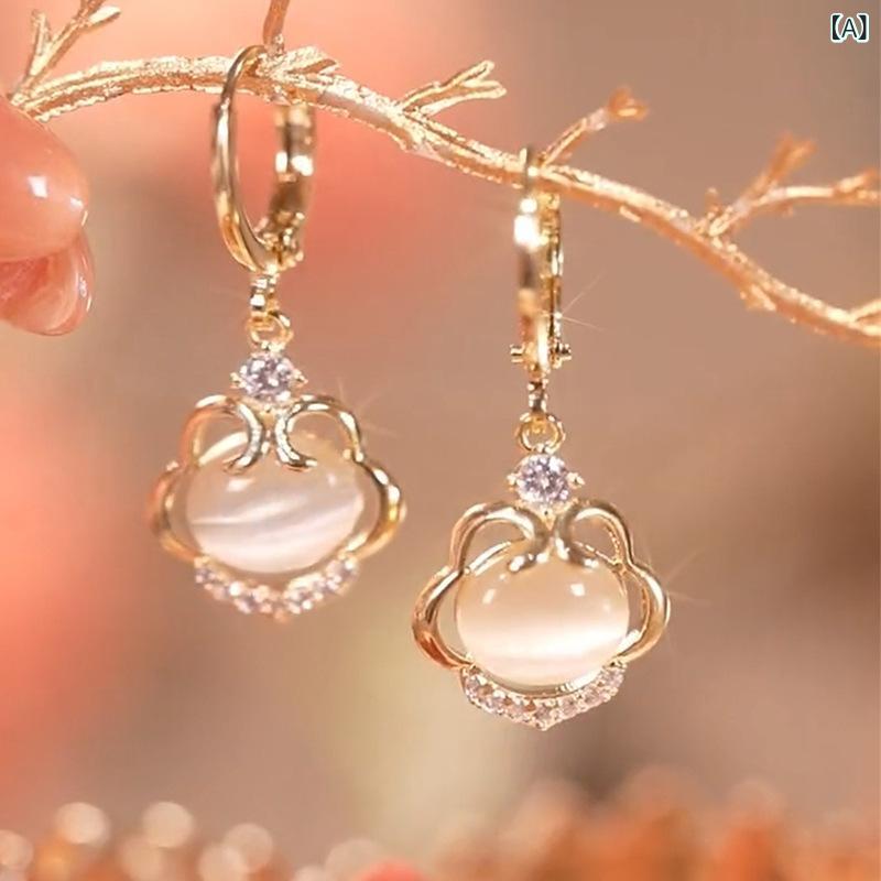ピアス レディース キャットアイストーン 如意鎖 デザインピアス フックピアス アクセサリー ジュエリー 耳飾り 揺れる 華奢 上品 かわいい お洒落 カジュアル フォーマル 普段使い デート パーティー ギフト 贈り物