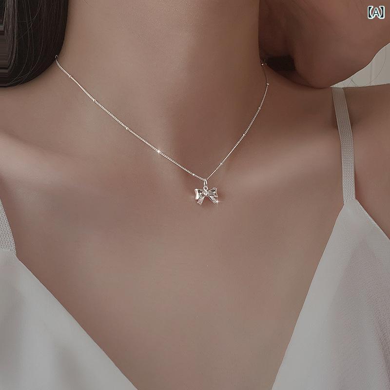 ネックレス レディース シルバー925 蝶結び リボンモチーフ 鎖骨チェーン シンプル かわいい おしゃれ 高級感 ペンダント アクセサリー 華奢 首飾り キラキラ デイリー使い 贈り物 重ね付け パーティー カジュアル プレゼント 記念日 誕生日 お祝