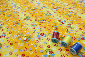 レーヨンちりめん 金彩花輪文様 黄色【布地 生地 和柄 縮緬 桜】