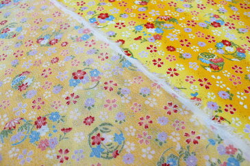 レーヨンちりめん 金彩花輪文様 黄色【布地 生地 和柄 縮緬 桜】