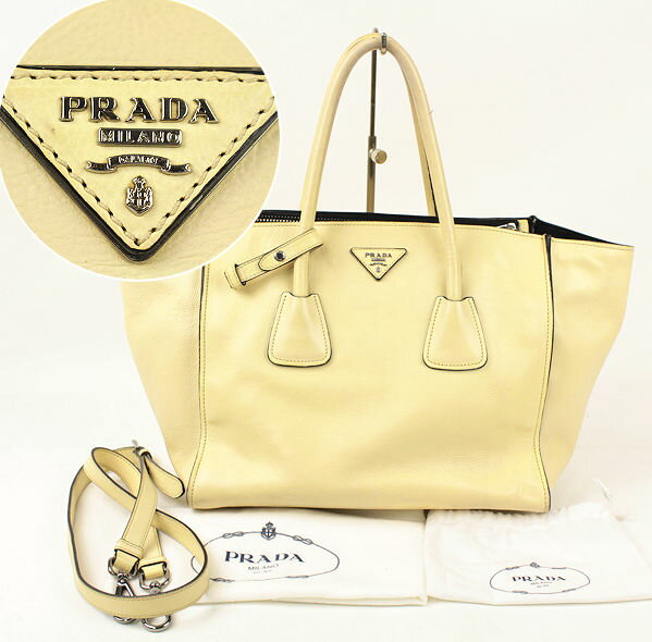 おすすめ!!【PRADA プラダ】2WAYバッグ ショルダー 大き目 ハンドバッグ クリーム レザー 保存袋 収納力あり 大人気 イタリア製 02335【中古】