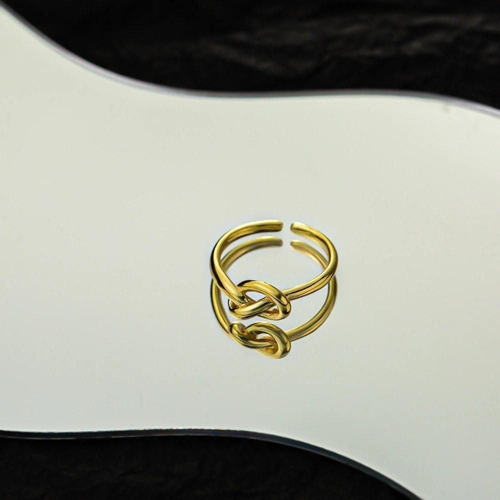 ファッションシンプルなラインリング女性の個性の韓国語版 寒風結びニッチデザイン開運人差し指リング潮