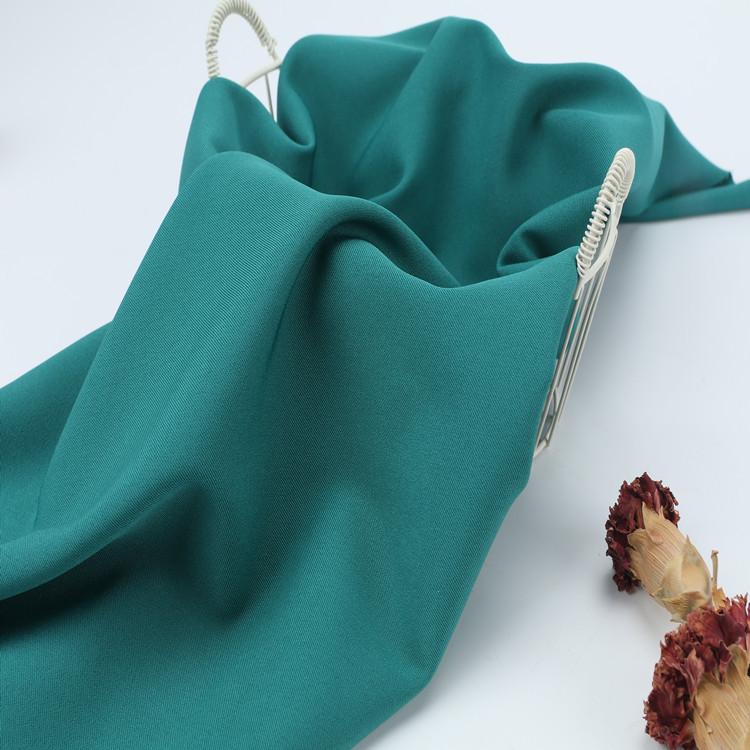 生地 ポリエステル スカート パンツ 制服 92%ポリエステル 8%ポリウレタン 綾織り 無地 染色加工 春夏 スーツ ズボン ワンピース チュニック