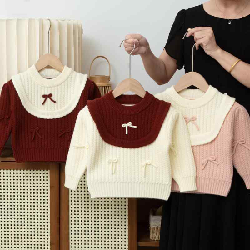 ニット・セーター ガールズ 子供服 アンゴラ赤 配色 かわいい 蝶結び 丸首 長袖 秋冬 綿85％ 通園 普段使い