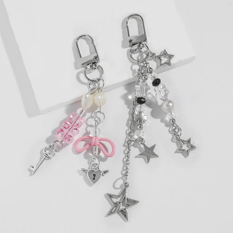 キーホルダー レディース キュート 蝶結び 五芒星 キューピッドの矢 クマ ストラップ ピンク ブラック ..