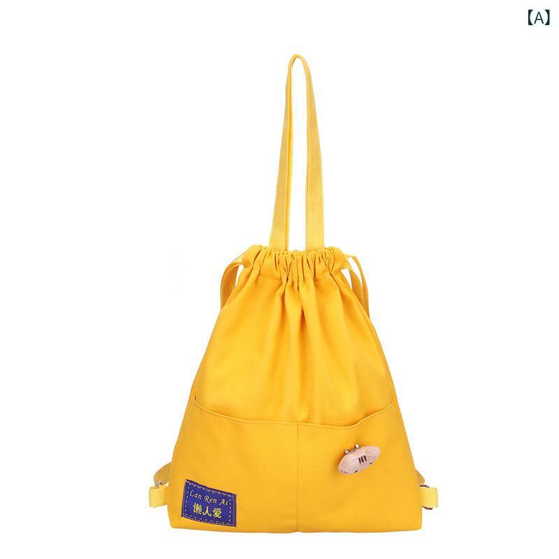 リュック レディース メンズ 学生 スクールバッグ 鞄 キャンバス 巾着型 カジュアル 旅行 イエロー ブ..
