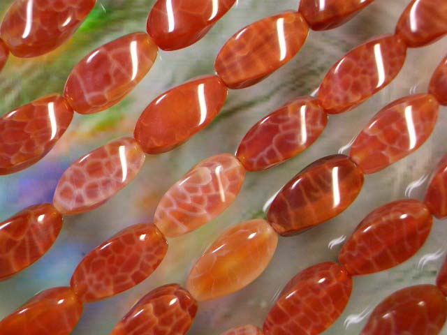 Rakuten - 天然石ビーズファイヤーアゲートライス4面カット16×8mm・1連40cm 25個前後