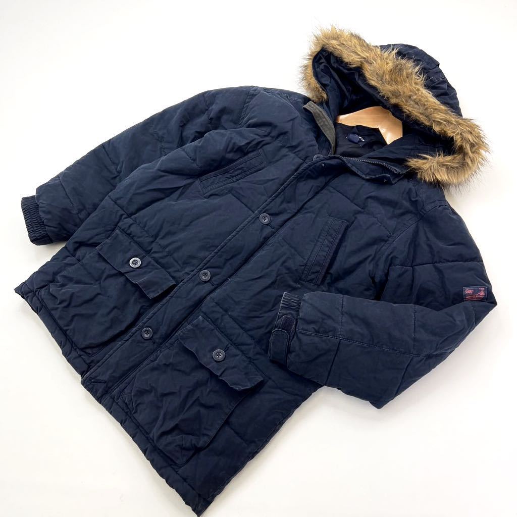 ギャップ ☆ GAP シンプルで渋め◎ 中綿 ジャケット ファーフード◎ ネイビー 160 メンズ キッズ 兼用 アウトドア アメカジ 街着◎■DF189 ブランドGAP サイズ表記・実寸（平置き計測）表記：160 実寸： 着丈69cm 身幅56cm 肩幅45cm 袖丈54cm ※必ず実寸をご確認の上、ご入札ください。 ※多少の誤差はご了承ください。 コンディション状態：古着のため、若干の使用感がございますが問題なくご着用頂けます。 状態ランク：10中 7 （中古品と言うことにご理解いただける方のみご入札をお願い致します。）