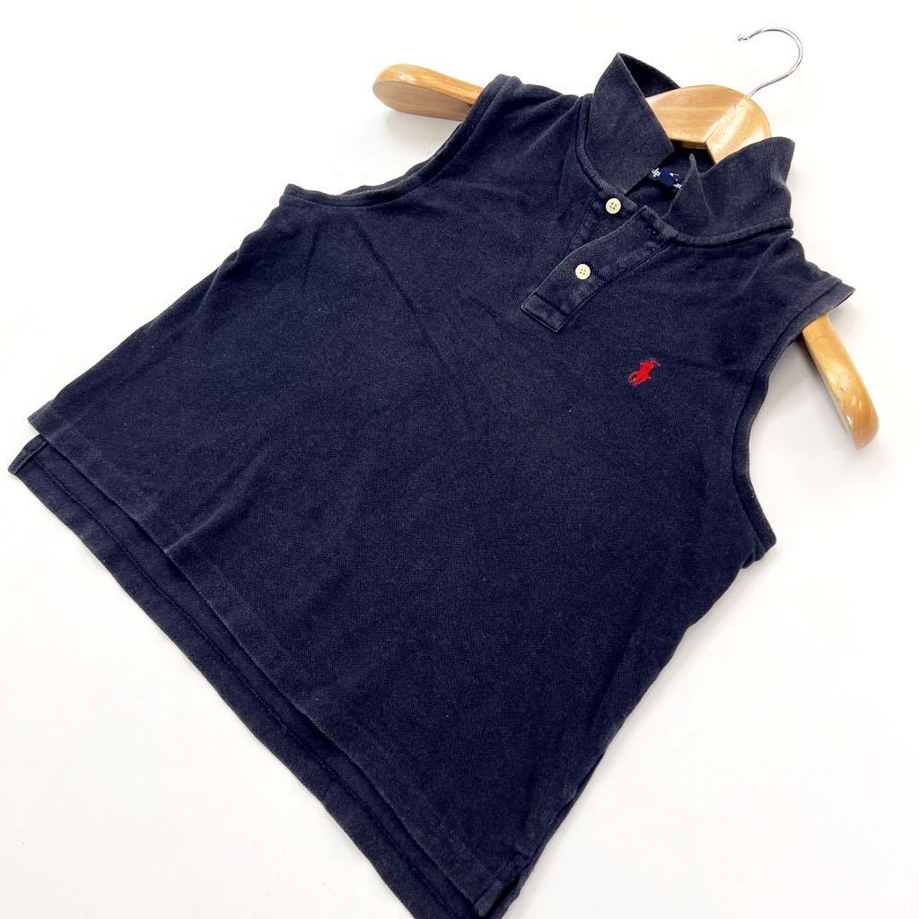 Ralph Lauren ☆ 160 キッズ レディース◎ ノースリーブ ポロシャツ 風合い◎ ネイビー 春夏 定番 大人カジュアル ラルフローレン■FE189 ブランドラルフローレン サイズ表記・実寸（平置き計測）表記：160 実寸： 着丈45cm 身幅44cm 肩幅30cm 袖丈-cm ※必ず実寸をご確認の上、ご入札ください。 ※多少の誤差はご了承ください。 コンディション状態：古着のため、若干の使用感がございますが問題なくご着用頂けます。 状態ランク：10中 7 （中古品と言うことにご理解いただける方のみご入札をお願い致します。）